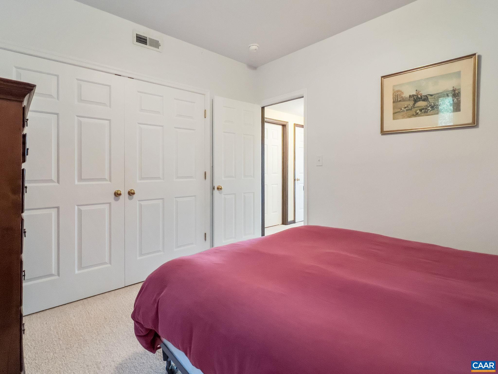 70 Percy Lane Fairfield, VA 24435 - Photo 43 of 52 a bedroom with a bed and a painting on the wall