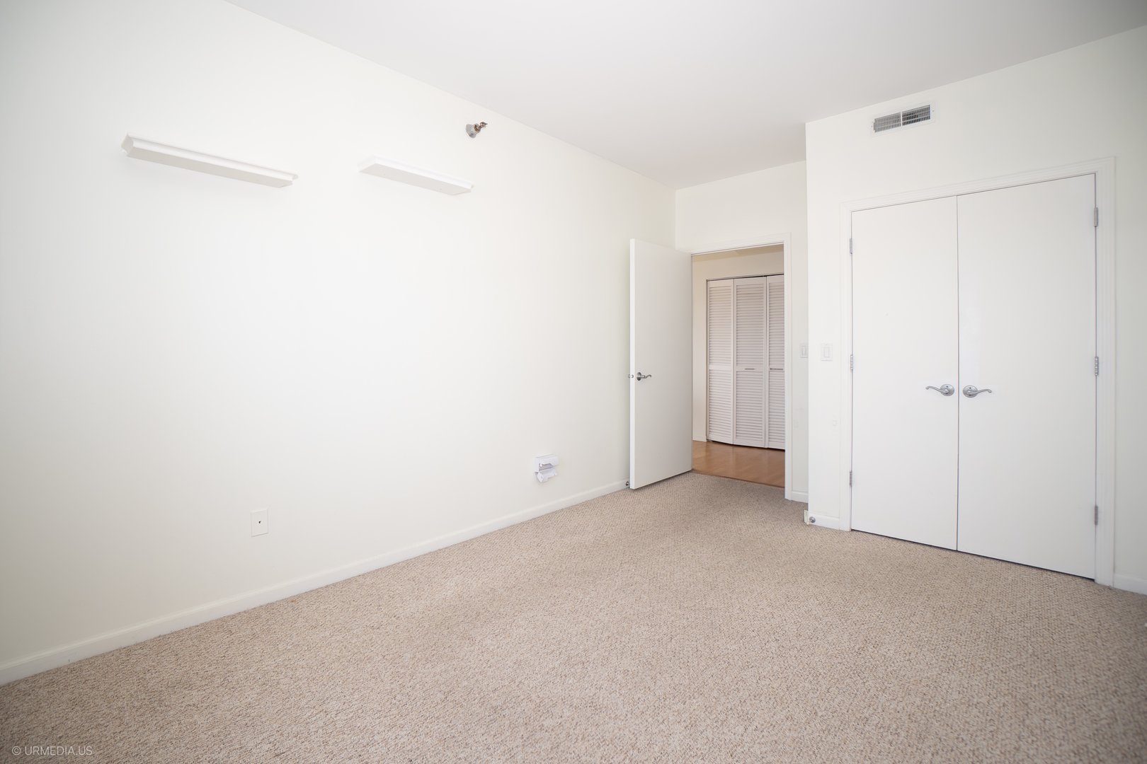 100 North Hermitage Avenue, Unit 716 Chicago, IL 60612 - Photo 18 of 25 a view of an empty room