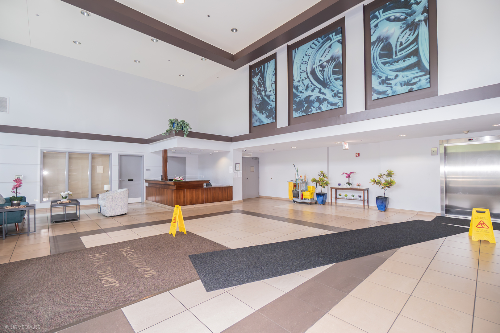 100 North Hermitage Avenue, Unit 716 Chicago, IL 60612 - Photo 24 of 25 a living room with furniture and painting on the wall