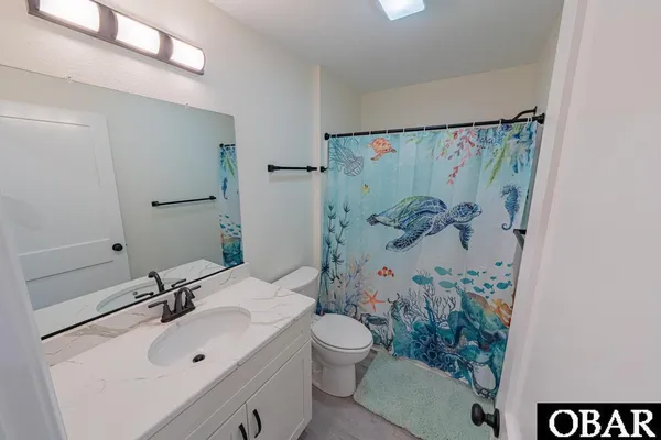 $869,000 | 40228 East Sunfish Court, Avon, NC 27915