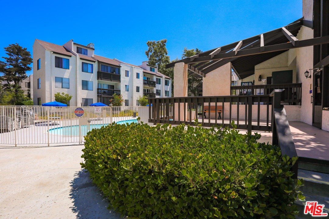 9302 Summertime Lane Culver City, CA 90230 - Photo 20 of 26 a view of a house with backyard and sitting area