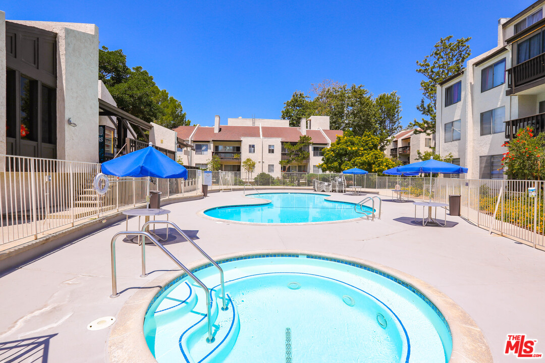 9302 Summertime Lane Culver City, CA 90230 - Photo 23 of 26 a swimming pool with outdoor seating and yard