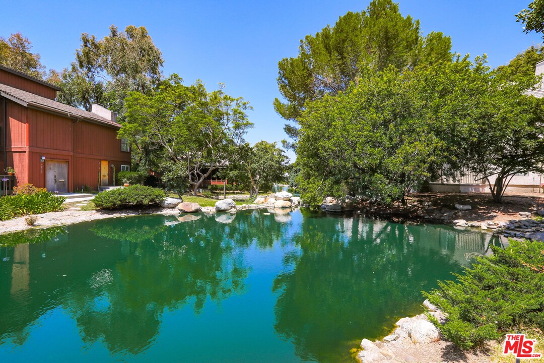 9302 Summertime Lane Culver City, CA 90230 - Photo 25 of 26 a lake view with a garden