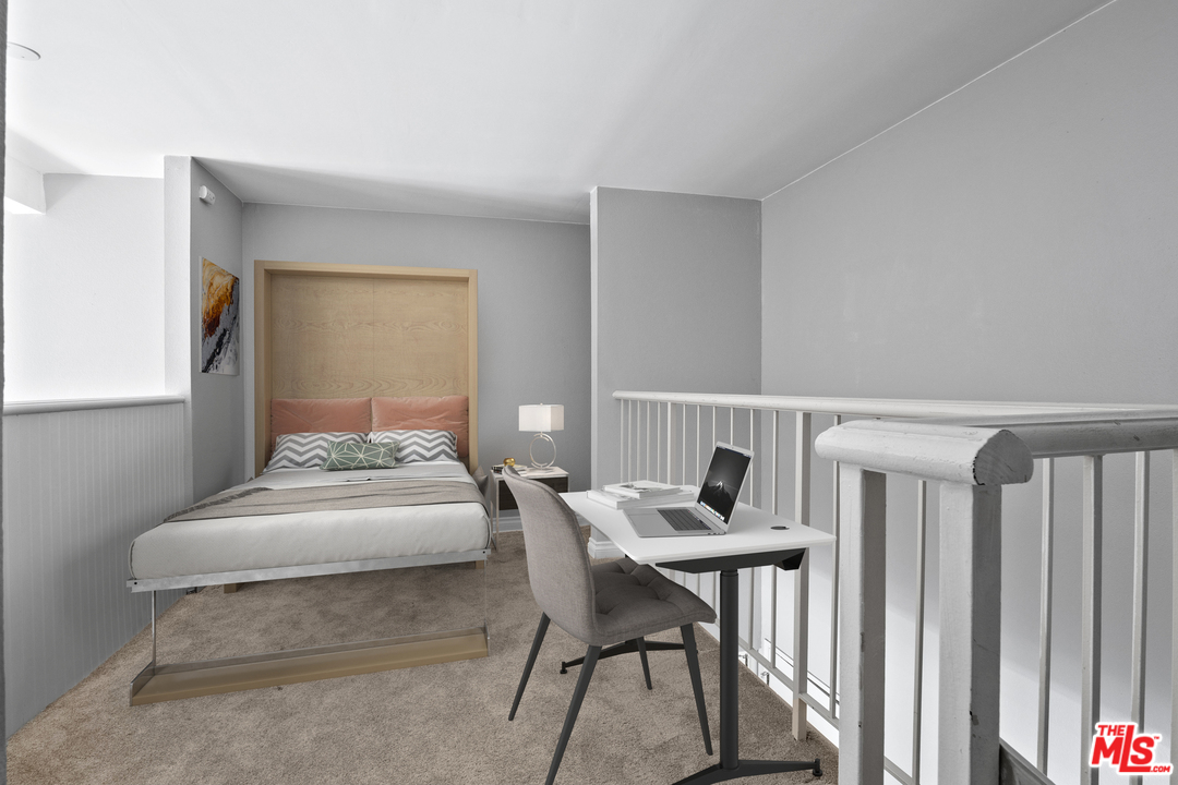 9302 Summertime Lane Culver City, CA 90230 - Photo 4 of 26 a bedroom with a bed and a table