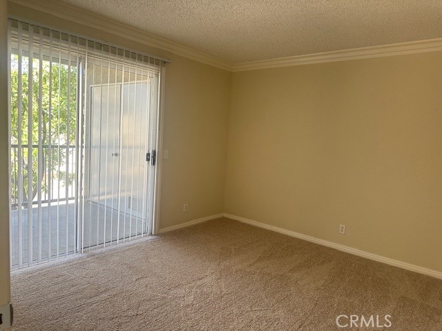3464 Hathaway Avenue, Unit 251 Long Beach, CA 90815 - Photo 7 of 15 a view of an empty room with a window