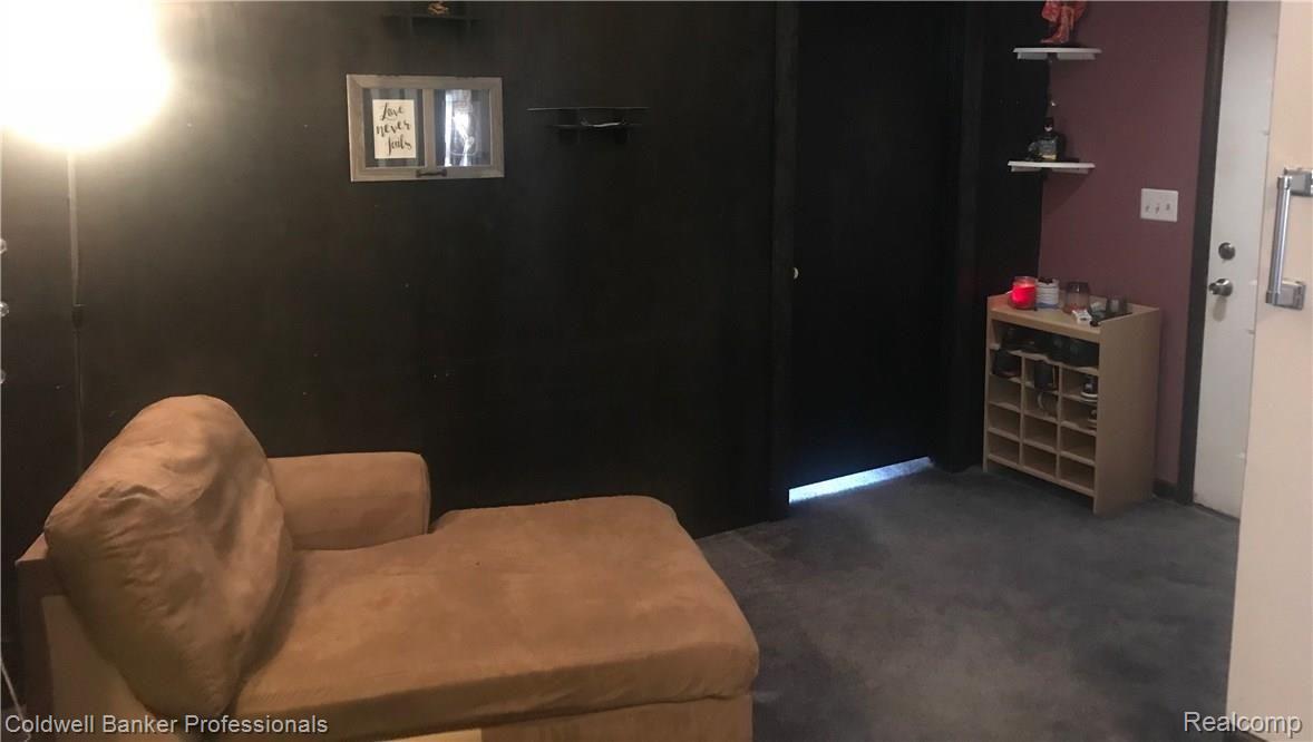 5394 Drayton Road Clarkston, MI 48346 - Photo 21 of 23 Currently being used as a sitting area. This is your exit to the backyard perfect for a mudroom