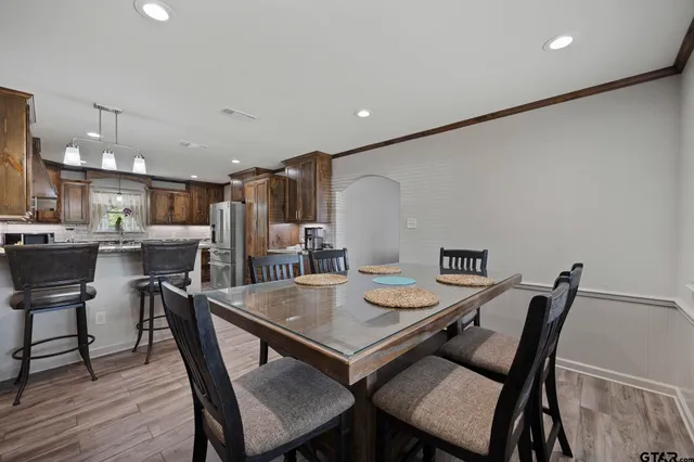 a view of a dining room with furniture