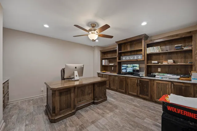 a kitchen with a stove and cabinets