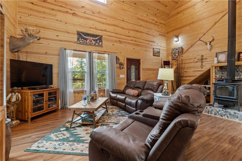 661 Wildcat Road Buchanan, GA 30113 - Photo 22 of 51 a living room with furniture and a flat screen tv