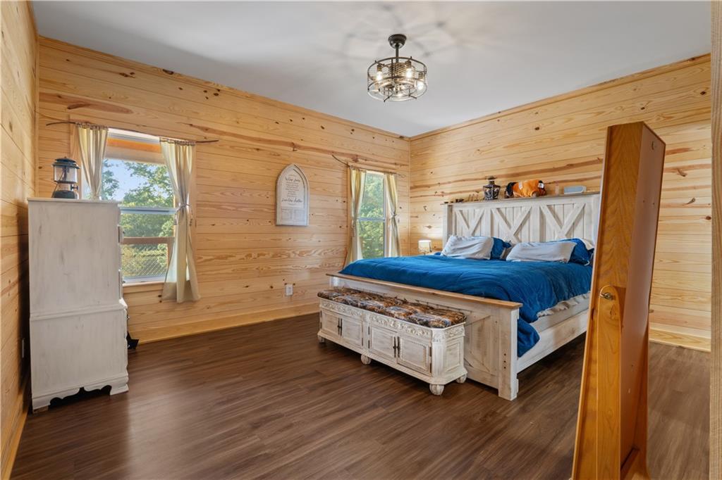 661 Wildcat Road Buchanan, GA 30113 - Photo 28 of 51 a living room with a dresser and a window