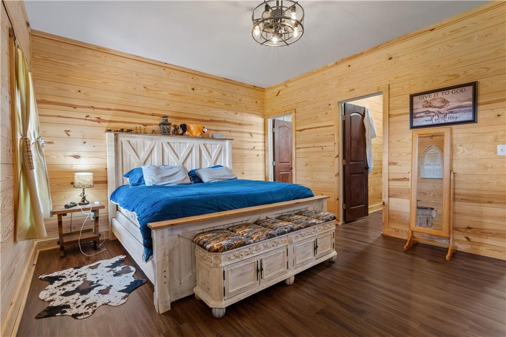 661 Wildcat Road Buchanan, GA 30113 - Photo 29 of 51 a bed sitting in a room next to a window