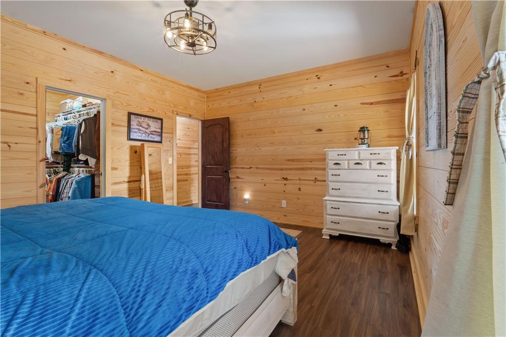 661 Wildcat Road Buchanan, GA 30113 - Photo 30 of 51 a view of bedroom with a bed and wooden floor