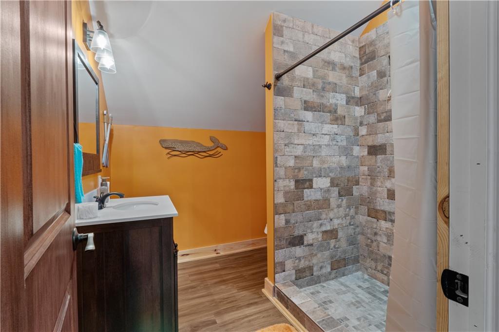 661 Wildcat Road Buchanan, GA 30113 - Photo 37 of 51 a bathroom with a sink and a mirror