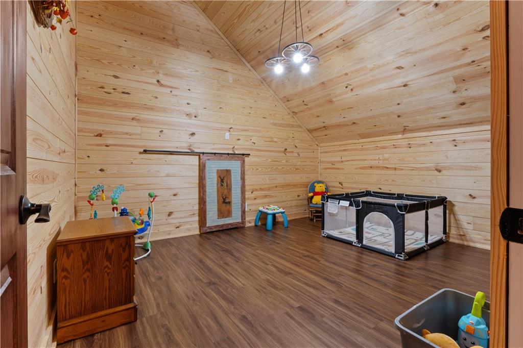 661 Wildcat Road Buchanan, GA 30113 - Photo 40 of 51 a view of a livingroom with furniture and wooden floor