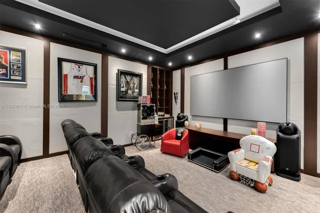 a bathroom with a granite countertop sink and a toilet