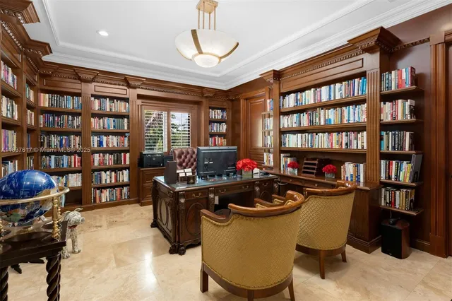 a bedroom with furniture and a flat screen tv