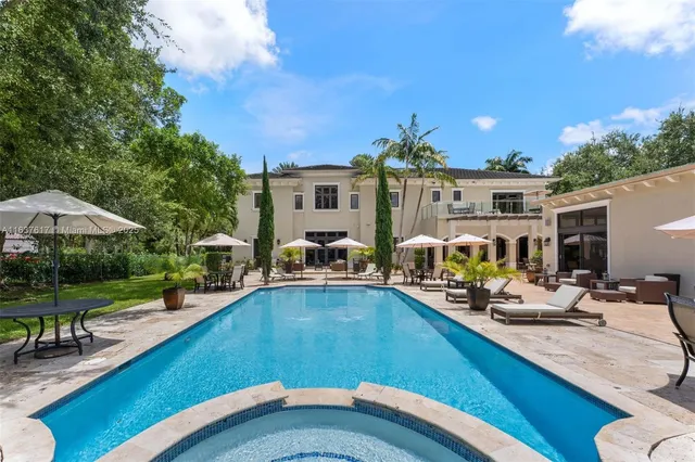 a view of car parked in front of house