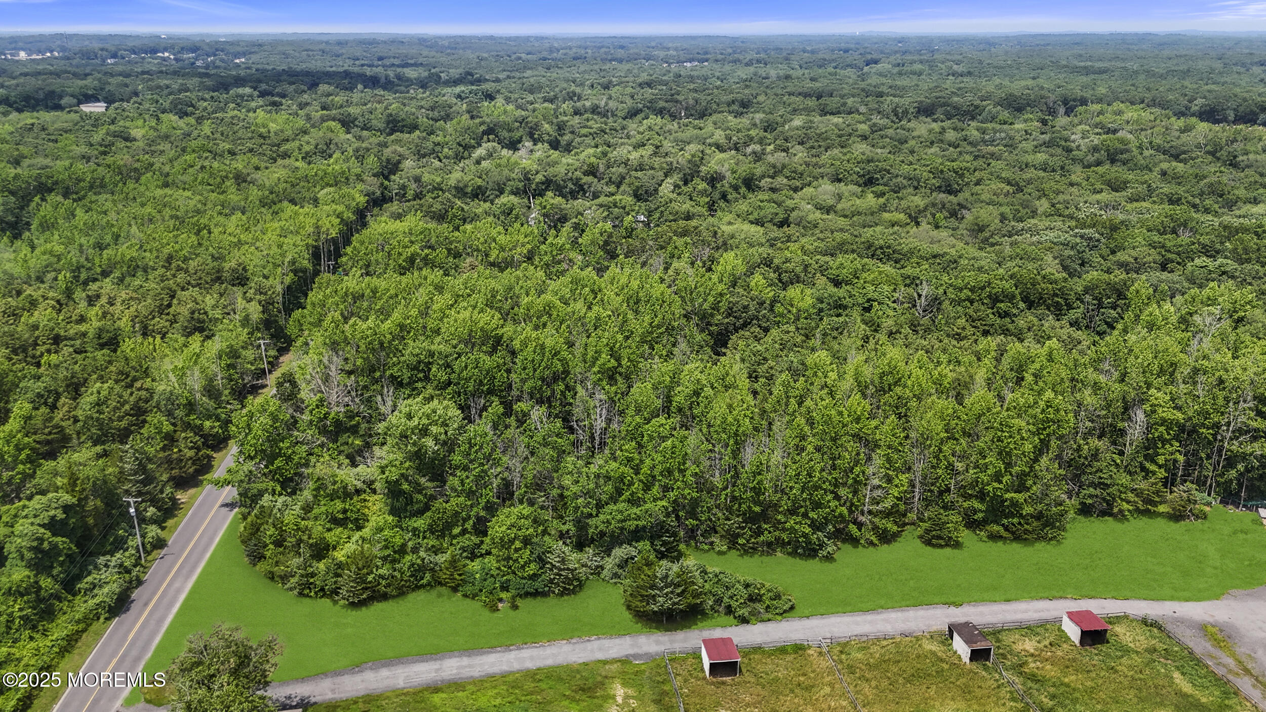 1070 Maxim Southard Road Howell, NJ 07731 - Photo 3 of 9 an aerial view of a houses with a yard