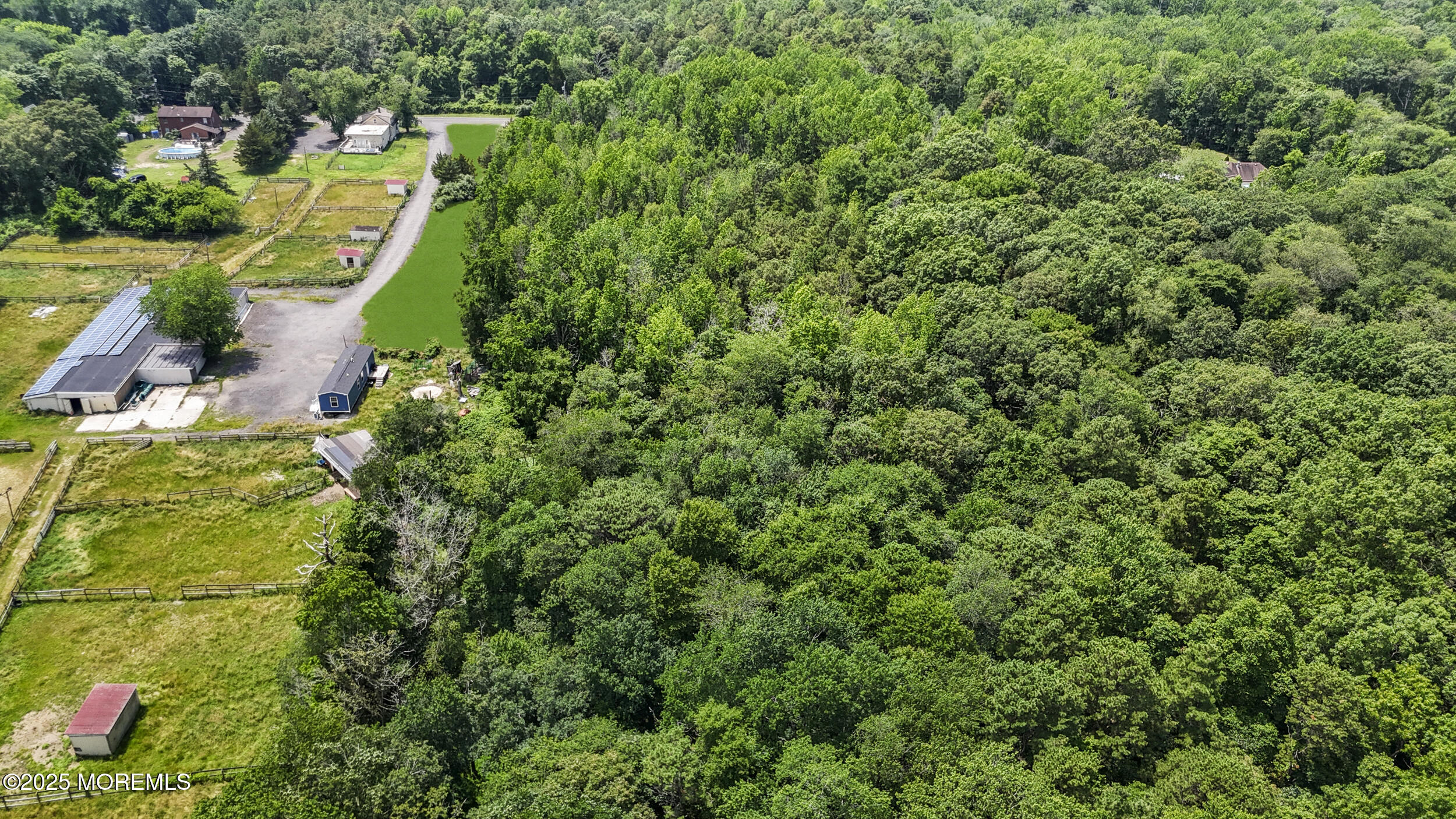 1070 Maxim Southard Road Howell, NJ 07731 - Photo 5 of 9 an aerial view of residential house with outdoor space and trees all around