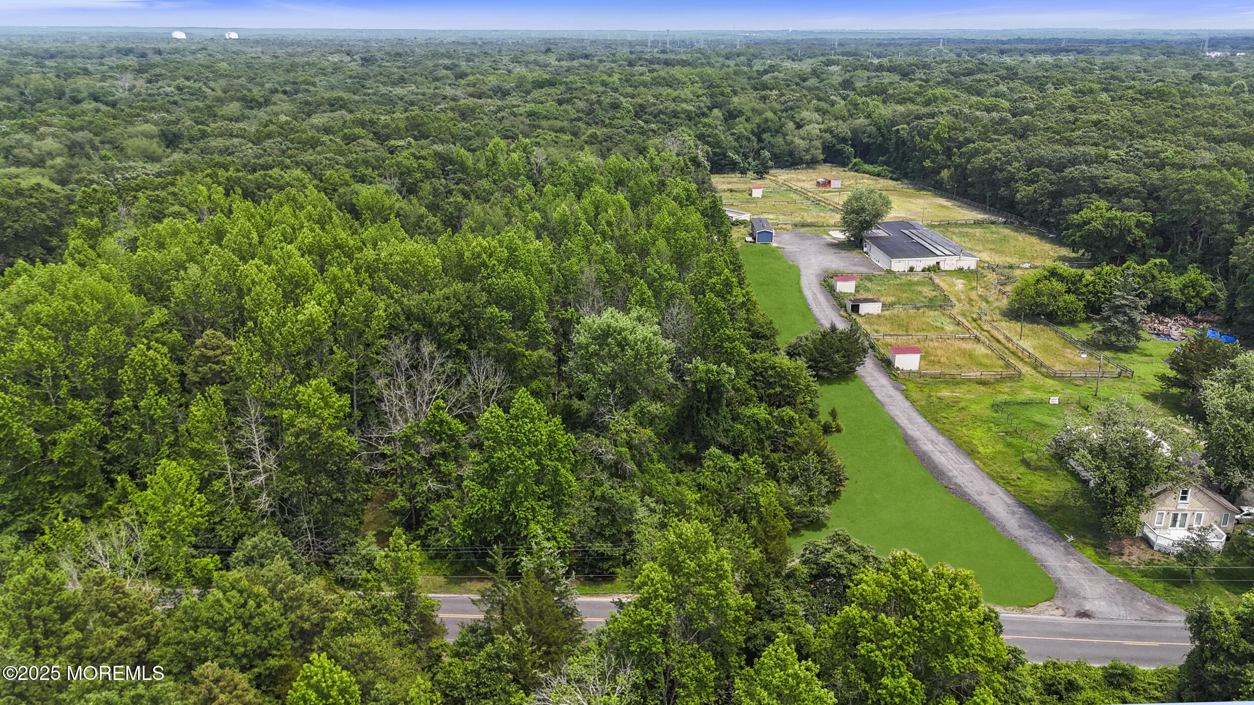 1070 Maxim Southard Road Howell, NJ 07731 - Photo 7 of 9 an aerial view of residential house with outdoor space and trees all around