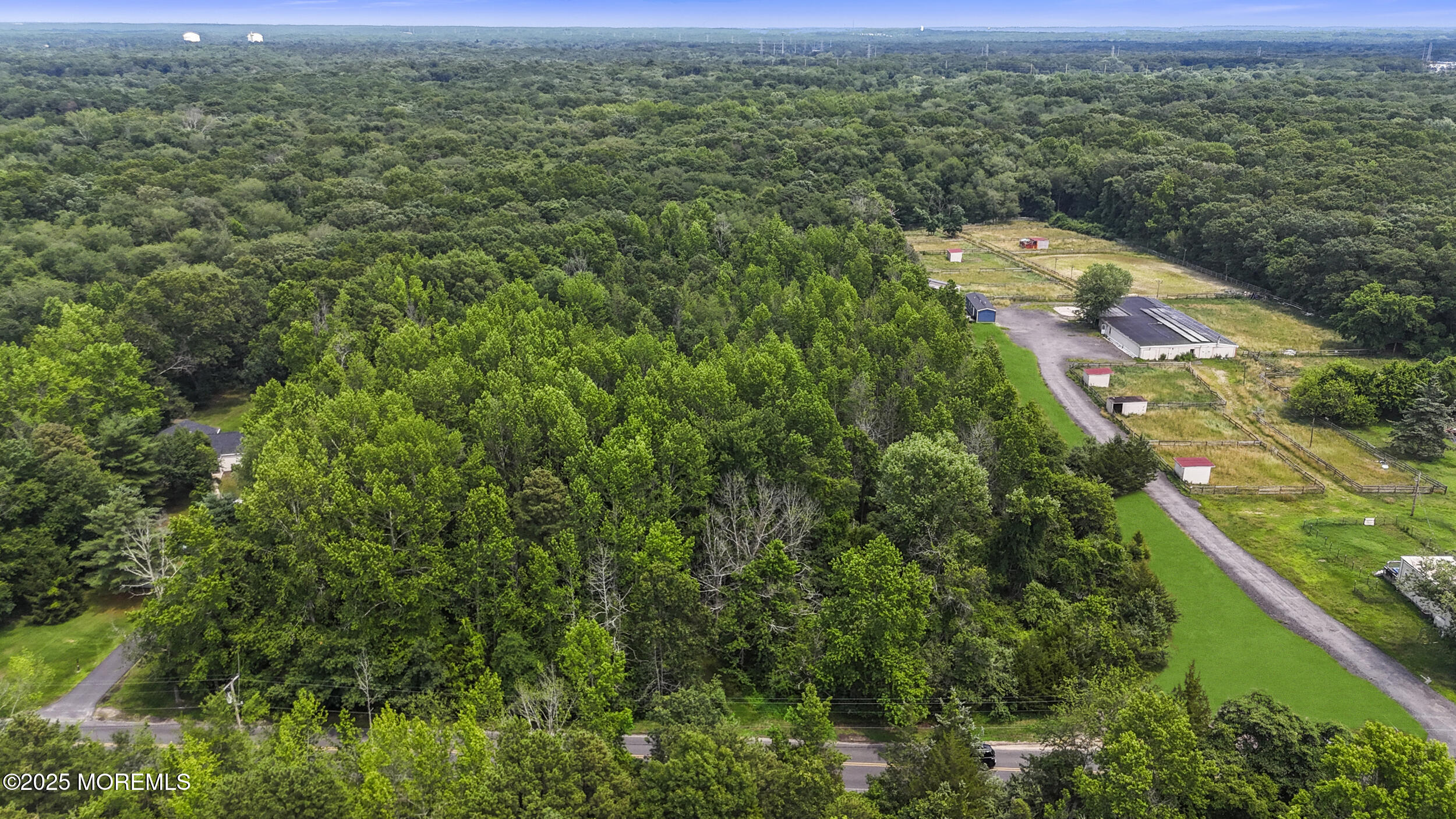 1070 Maxim Southard Road Howell, NJ 07731 - Photo 8 of 9 an aerial view of residential houses with outdoor space