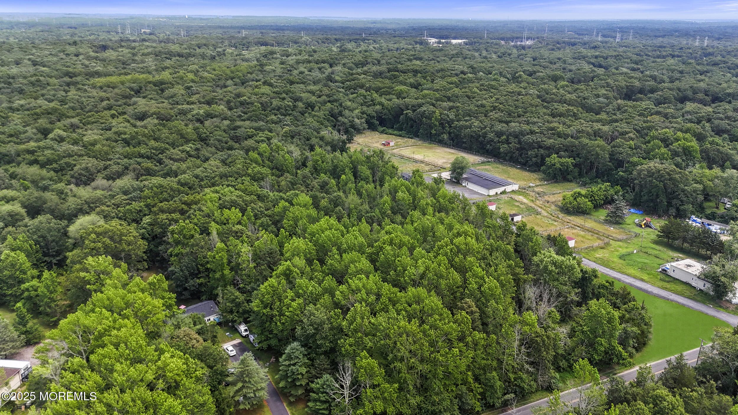 1070 Maxim Southard Road Howell, NJ 07731 - Photo 9 of 9 an aerial view of residential houses with outdoor space and trees
