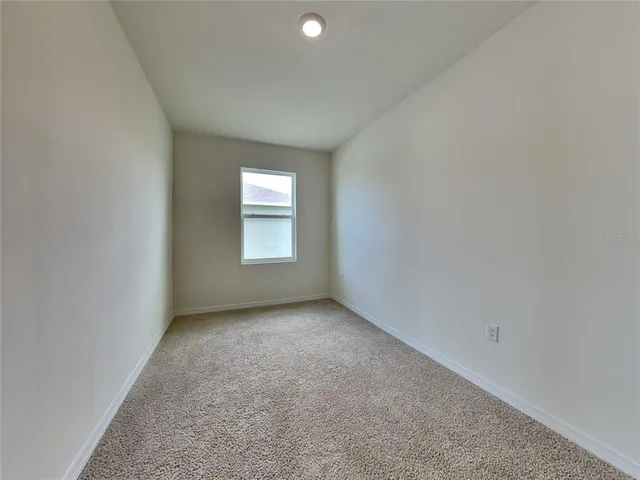 a view of a window in an empty room