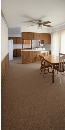 a room with furniture and a window