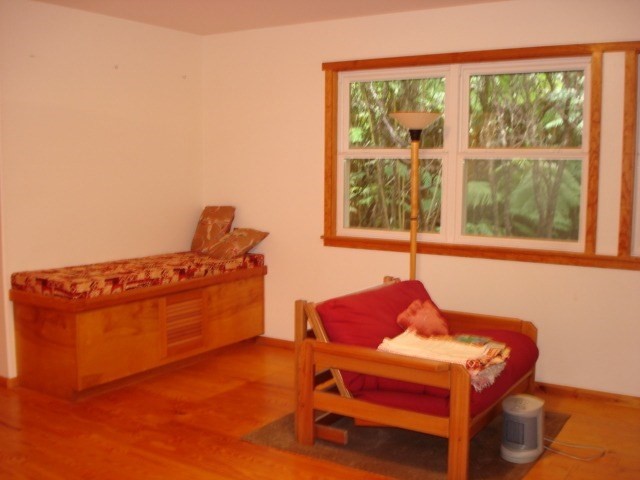 19-4031 Haunani Road Volcano, HI 96785 - Photo 5 of 21 a view of a workspace with furniture and a window