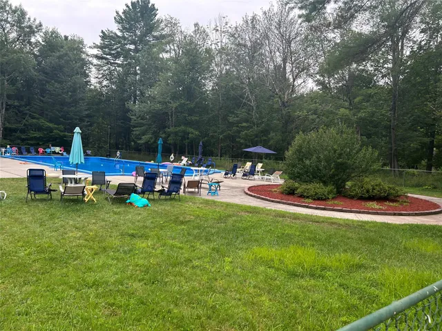 a childrens park with lots of swings and slides