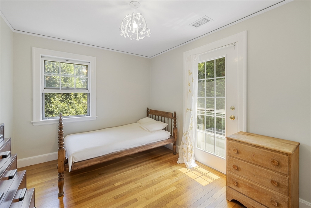 208 Rutledge Road Belmont, MA 02478 - Photo 22 of 34 a bedroom with a bed and a window