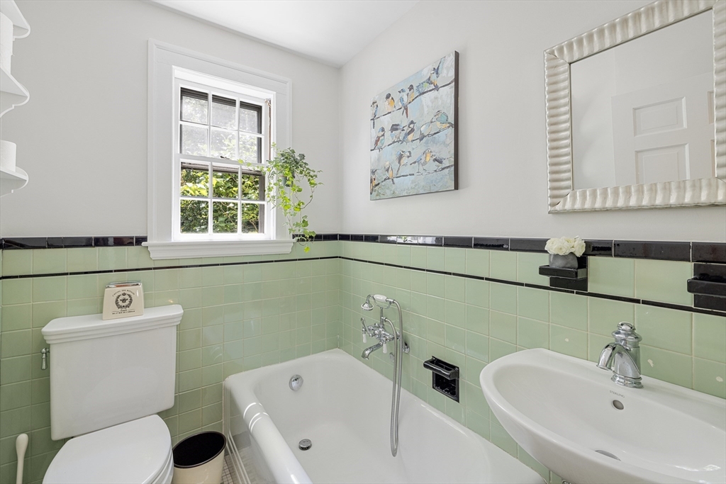 208 Rutledge Road Belmont, MA 02478 - Photo 26 of 34 a bathroom with a sink and a toilet