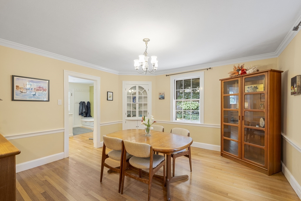 208 Rutledge Road Belmont, MA 02478 - Photo 8 of 34 a view of a dining room with furniture window and wooden floor