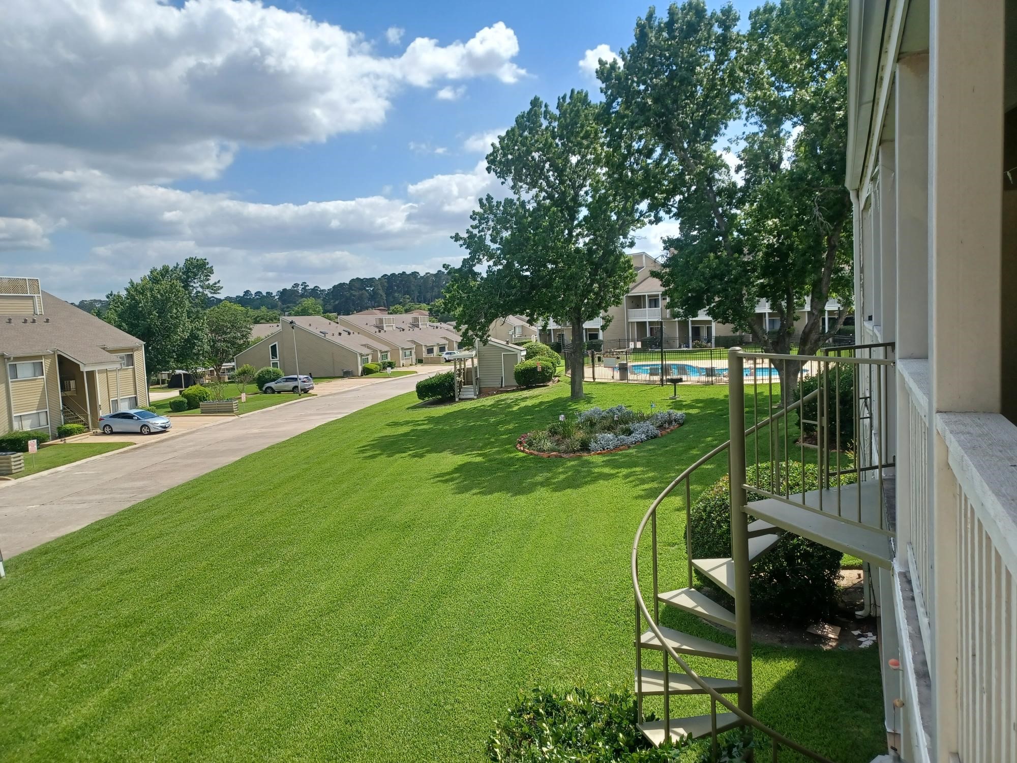 128 April Point Drive South Conroe, TX 77356 - Photo 25 of 26 a view of yard with seating and green space
