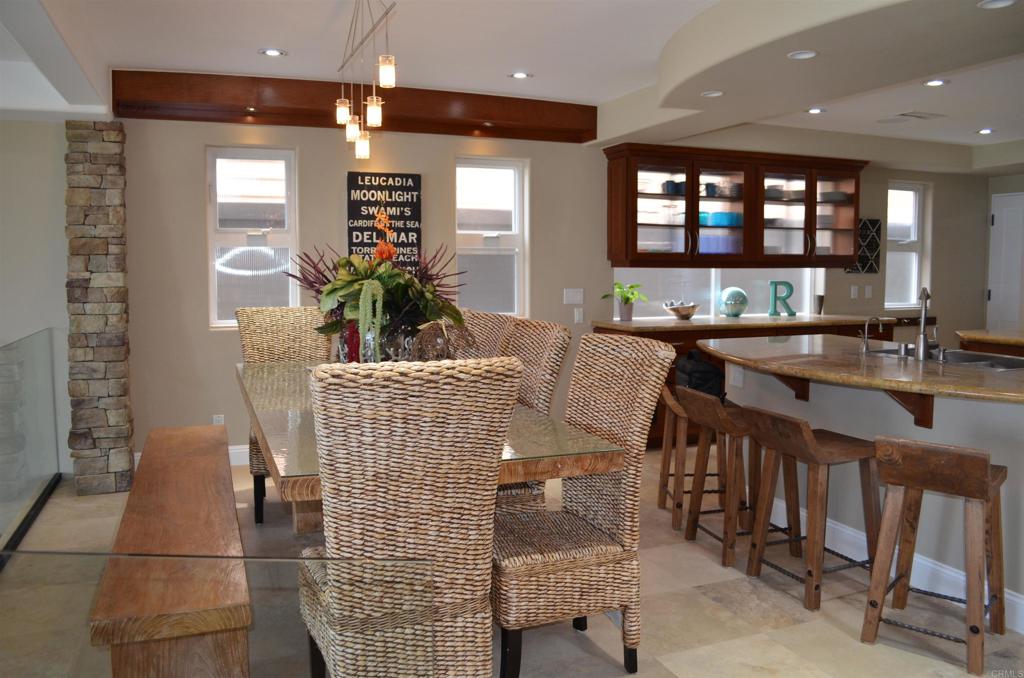 378 Neptune Avenue Encinitas, CA 92024 - Photo 21 of 45 a view of a dining room with furniture