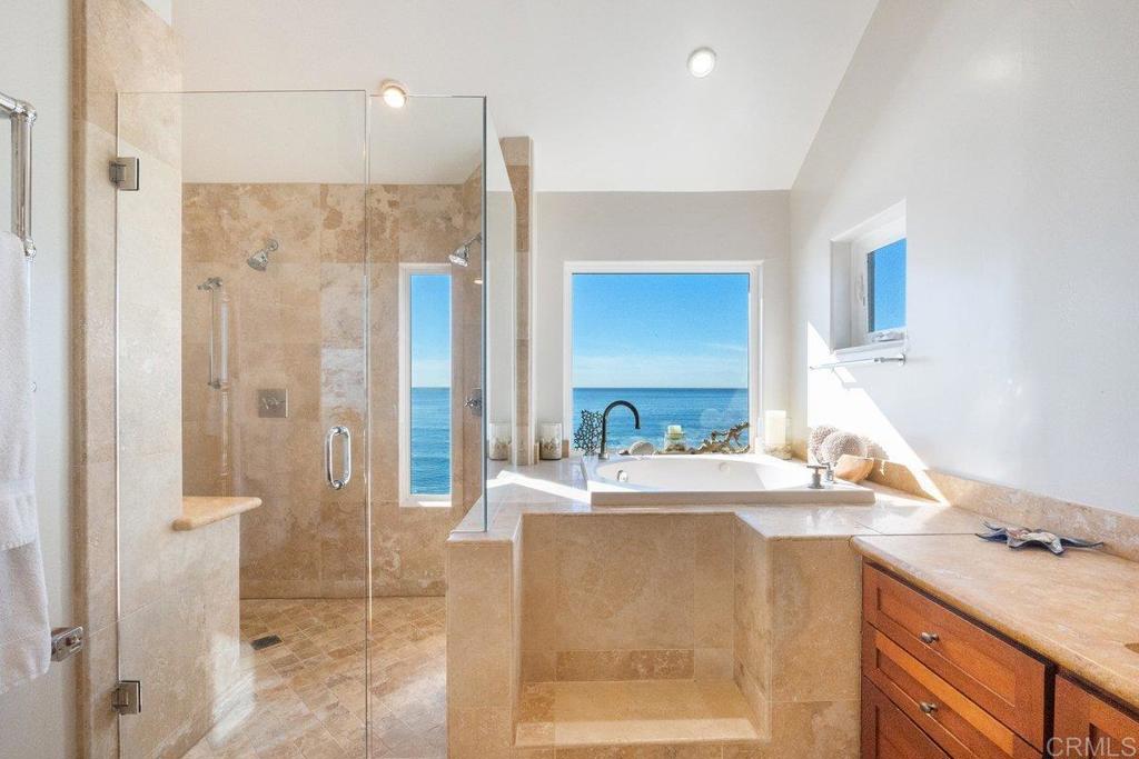 378 Neptune Avenue Encinitas, CA 92024 - Photo 35 of 45 a bathroom with a double vanity sink mirror and shower