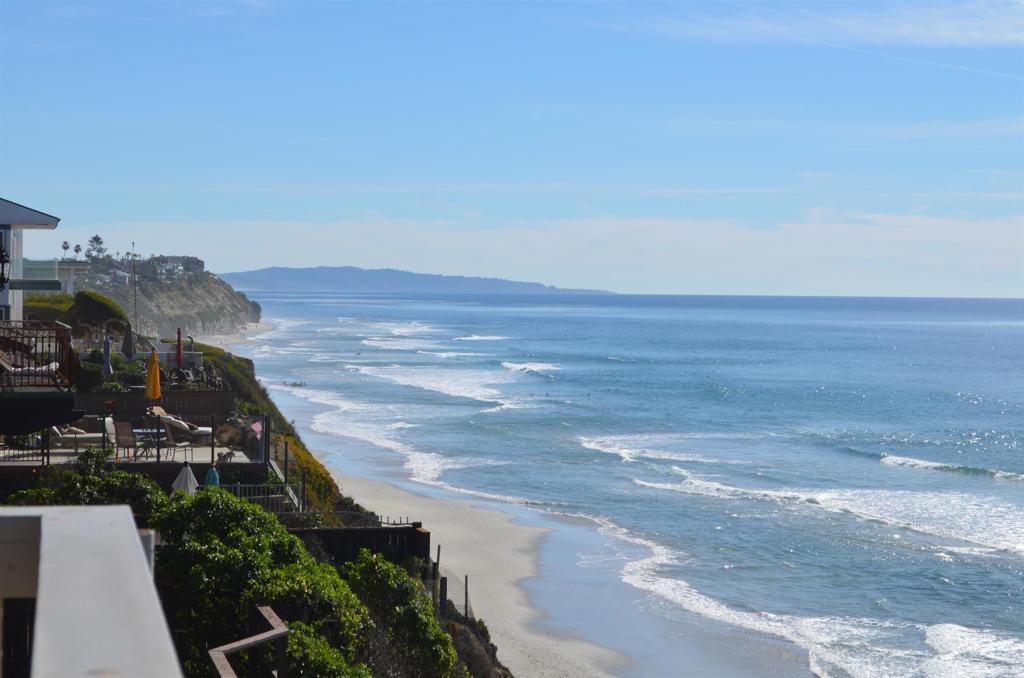 378 Neptune Avenue Encinitas, CA 92024 - Photo 4 of 45 a view of a city street view with ocean view