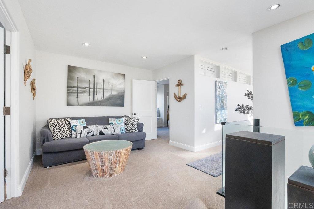 378 Neptune Avenue Encinitas, CA 92024 - Photo 44 of 45 a living room with furniture and a couch
