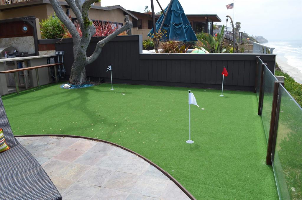 378 Neptune Avenue Encinitas, CA 92024 - Photo 5 of 45 a backyard of a house with lots of green space
