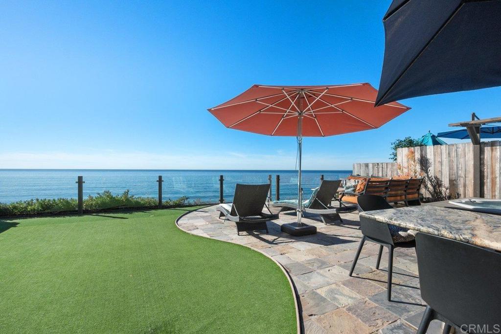378 Neptune Avenue Encinitas, CA 92024 - Photo 8 of 45 a view of a backyard with sitting area
