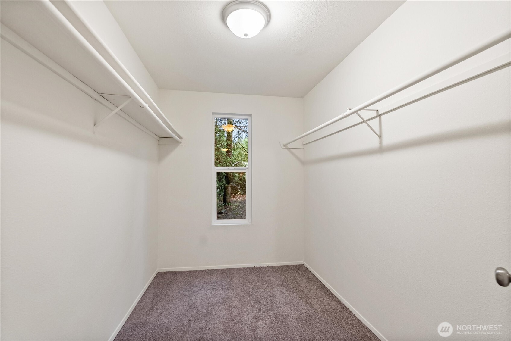 4785 Northwest Anderson Hill Road Silverdale, WA 98383 - Photo 27 of 38 a view of an empty room with a window