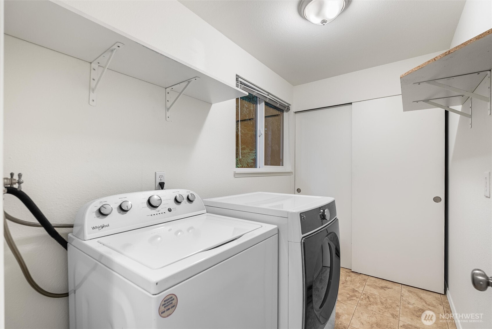 4785 Northwest Anderson Hill Road Silverdale, WA 98383 - Photo 29 of 38 a utility room with dryer and washer