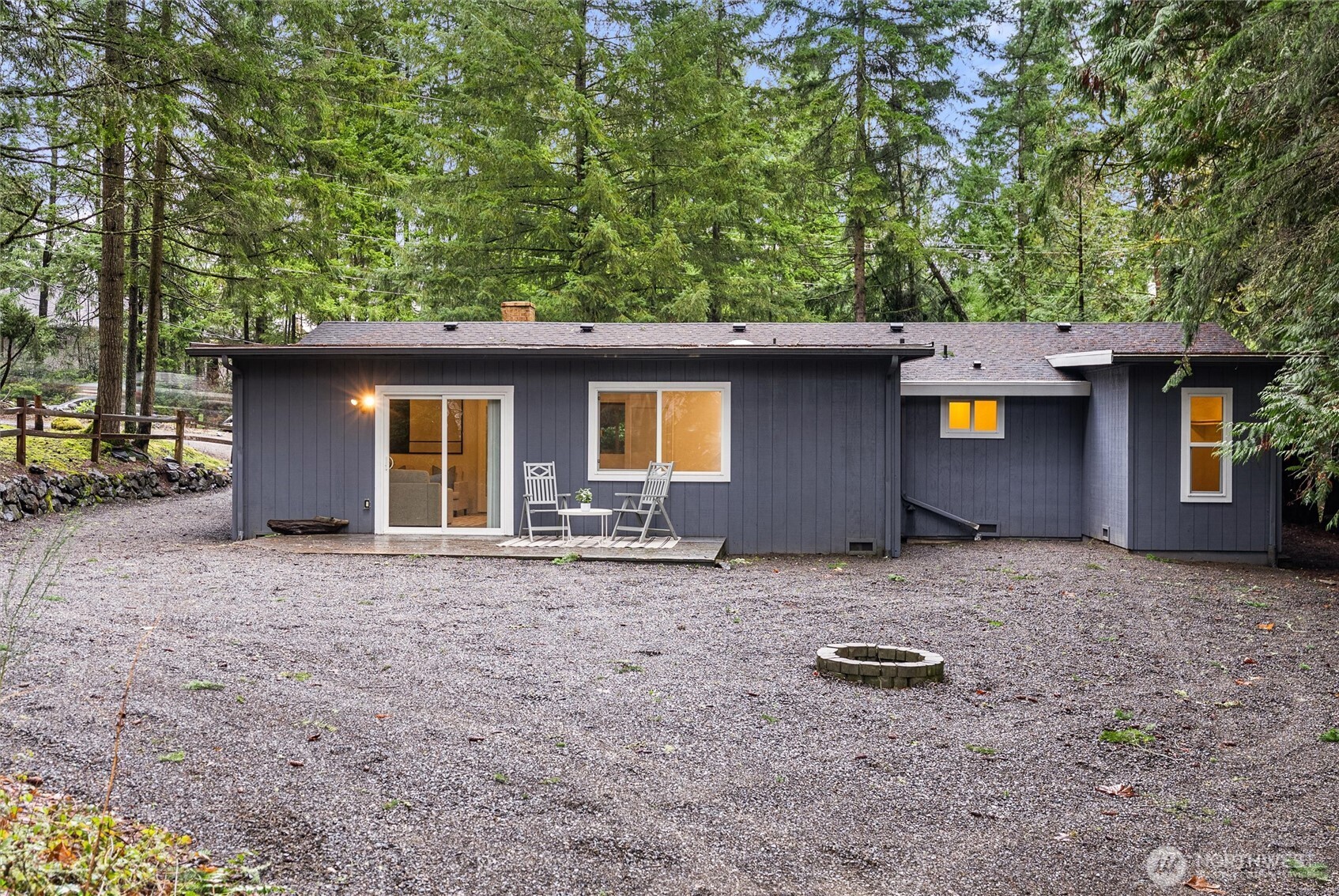 4785 Northwest Anderson Hill Road Silverdale, WA 98383 - Photo 32 of 38 a backyard of a house with barbeque oven