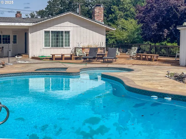 a view of outdoor space yard and swimming pool