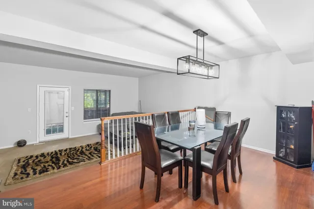 a kitchen with a sink a stove and cabinets