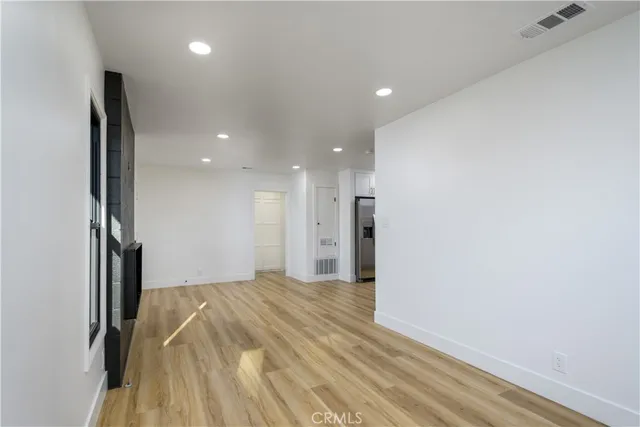 a view of hallway with a large window