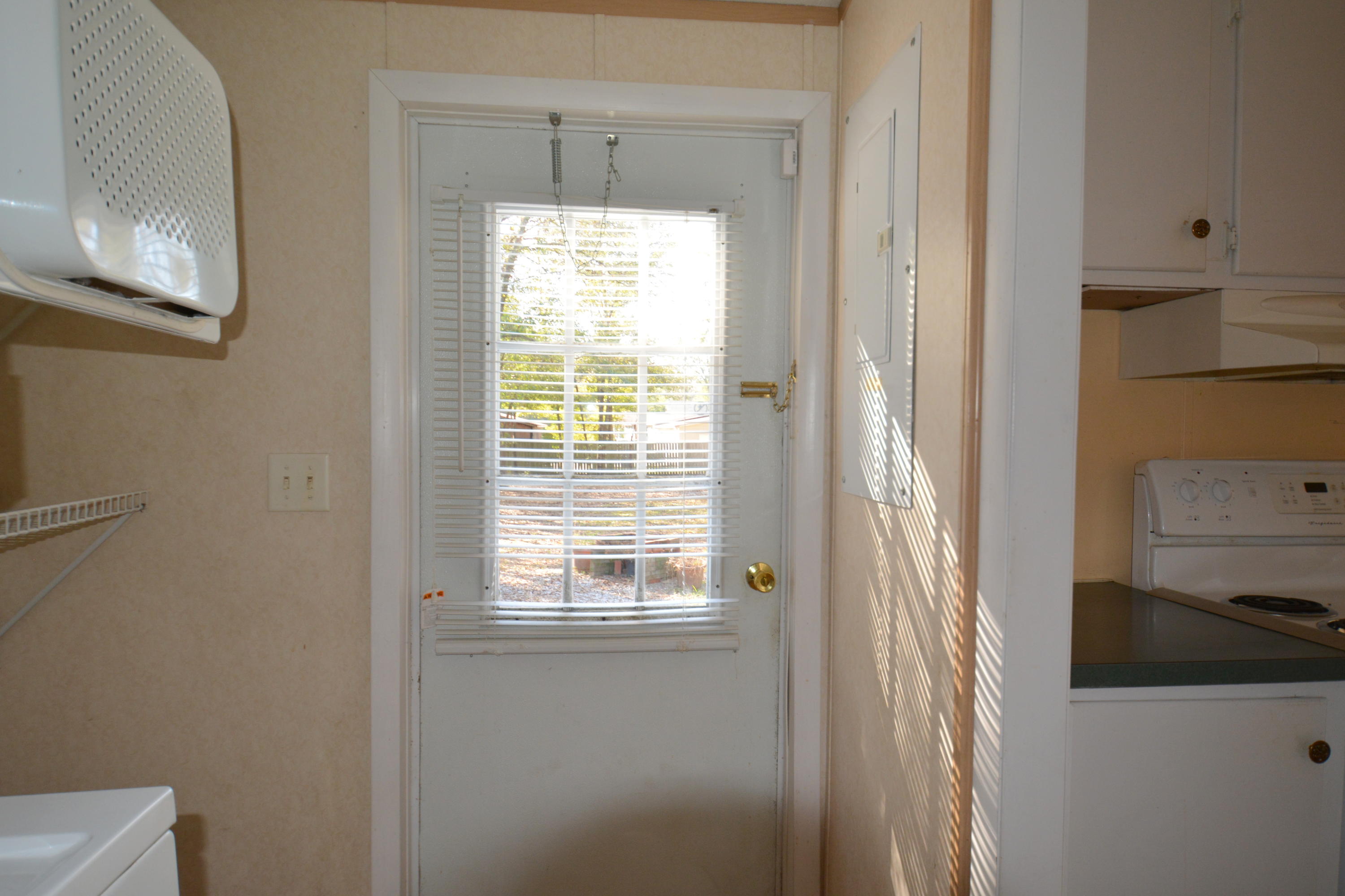 5729 Blufton Road Hollywood, SC 29449 - Photo 32 of 32 back door from laundry room leading to d