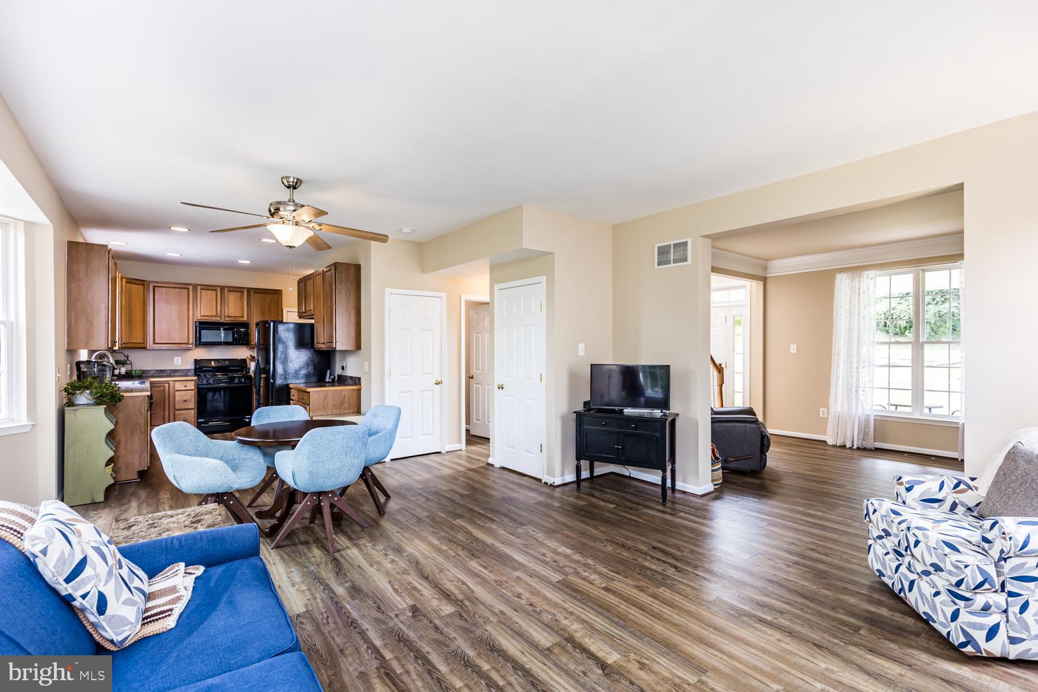 3931 Hunter Road Ellicott City, MD 21043 - Photo 3 of 50 Family room is open to kitchen and b'fast area