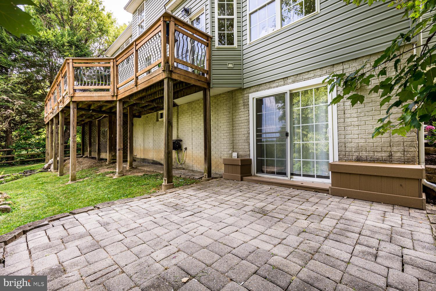 3931 Hunter Road Ellicott City, MD 21043 - Photo 36 of 50 Back of house with walk-out and patio