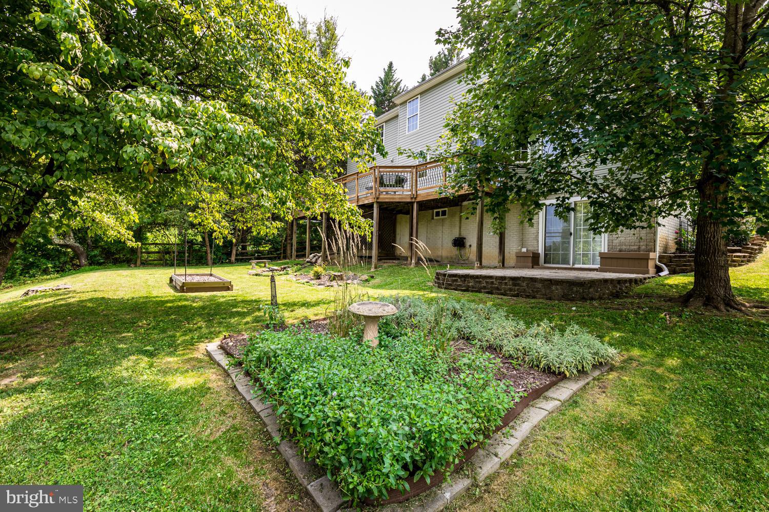 3931 Hunter Road Ellicott City, MD 21043 - Photo 38 of 50 Back yard garden, pond and more
